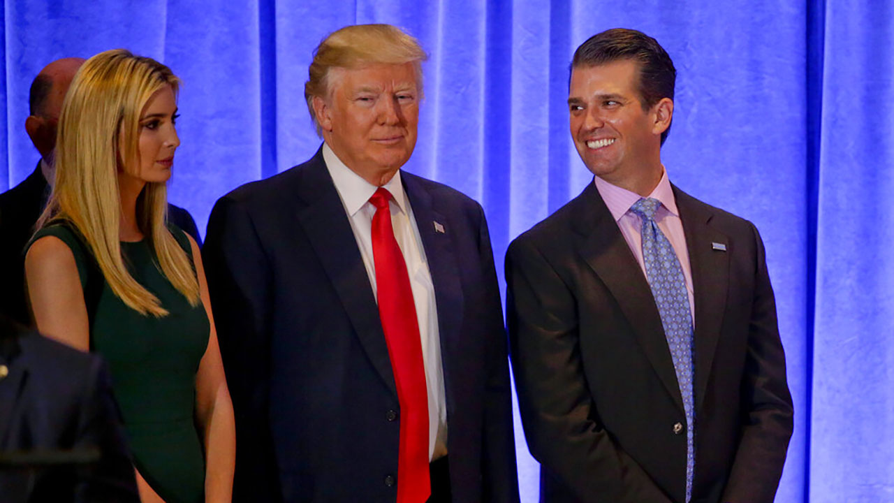 President-elect Donald Trump waits with family members Ivanka Trump, left, and Donald Trump Jr. before speaking at a news conference, Wednesday, Jan. 11, 2017, in New York. (AP Photo/Seth Wenig)