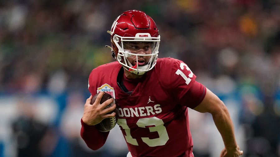 Oklahoma quarterback Caleb Williams (13) during the first half of the Alamo Bowl NCAA college football game against Oregon, Wednesday, Dec. 29, 2021, in San Antonio. (AP Photo/Eric Gay)