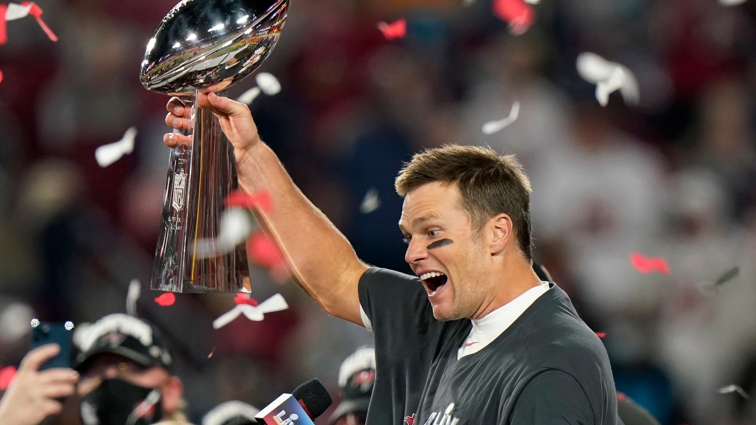 In this Feb. 7, 2021, file photo, Tampa Bay Buccaneers quarterback Tom Brady celebrates with the Vince Lombardi Trophy after the team's NFL Super Bowl 55 football game against the Kansas City Chiefs in Tampa, Fla. Tom Brady has retired after winning seven Super Bowls and setting numerous passing records in an unprecedented 22-year-career. He made the announcement, Tuesday, Feb. 1, 2022, in a long post on Instagram. (AP Photo/Lynne Sladky, File)