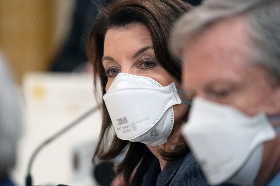 Gov. Kathy Hochul, D-N.Y., listens as President Joe Biden speaks during a meeting with the National Governors Association in the East Room of the White House, Monday, Jan. 31, 2022, in Washington. (AP Photo/Alex Brandon)