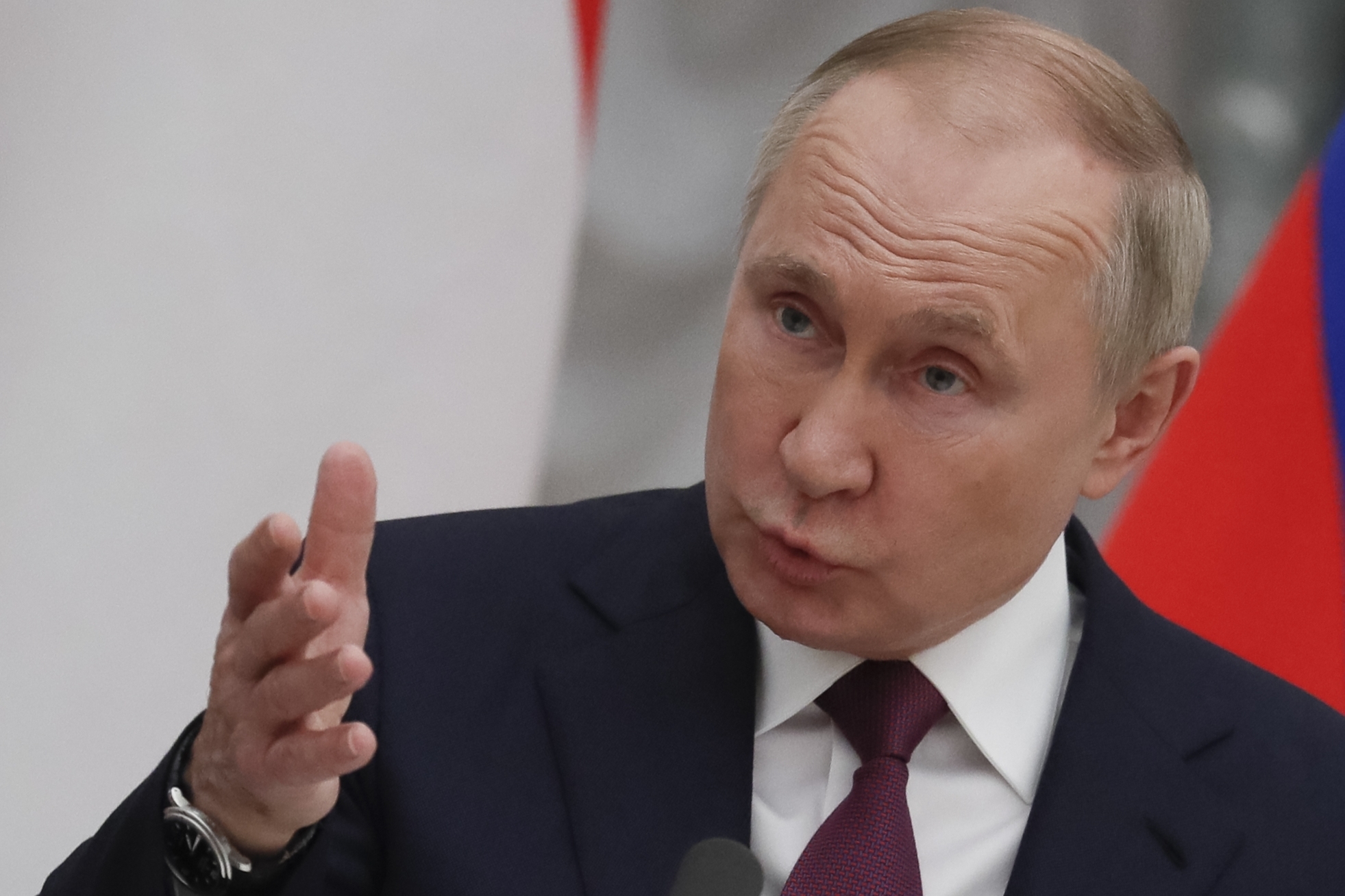 Russian President Vladimir Putin gestures while speaking to the media during a joint news conference with Hungary's Prime Minister Viktor Orban following their talks in Russia on Feb. 1, 2022. (Yuri Kochetkov/Pool Photo via Associated Press)