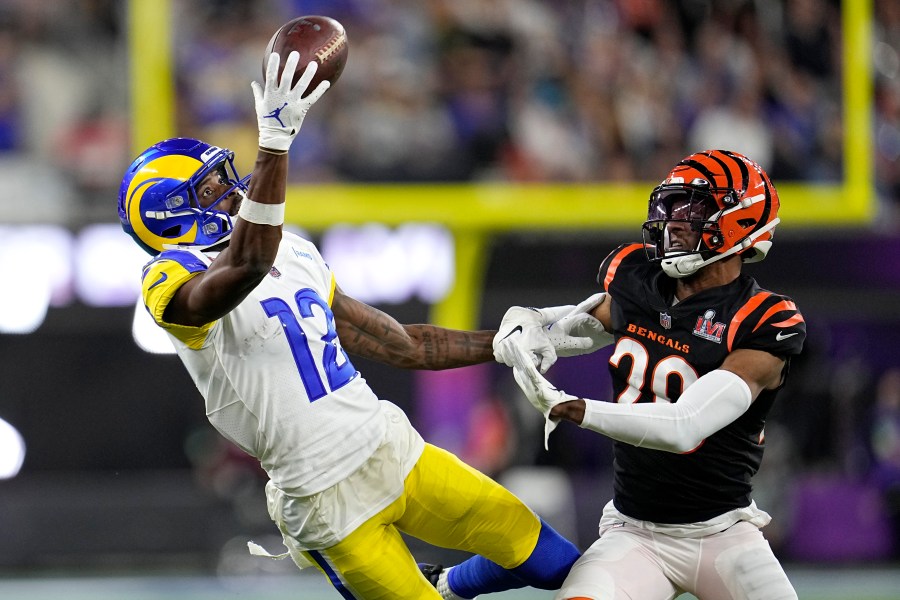 Los Angeles Rams wide receiver Van Jefferson (12) attempts a catch against Cincinnati Bengals cornerback Eli Apple during the second half of the NFL Super Bowl 56 on Feb. 13, 2022, in Inglewood. (Marcio Jose Sanchez/Associated Press)