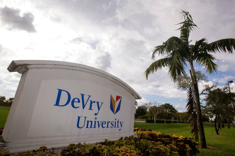 This Nov. 24, 2009, photo, shows the entrance to the DeVry University in Miramar, Fla. The Biden administration says it will cancel more than $70 million in student debt for borrowers who say they were defrauded by the for-profit DeVry University. It marks the first time the Education Department has approved such claims for an institution that's still in operation. (AP Photo/J Pat Carter, File)