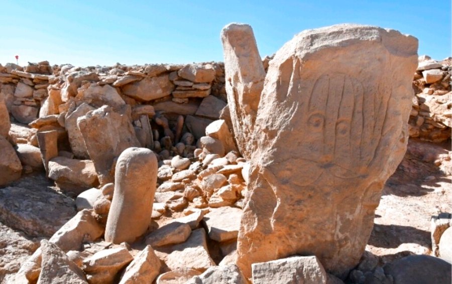 This photo provided by Jordan Tourism Ministry shows two carved standing stones at a remote Neolithic site in Jordan’s eastern desert. (Tourism Ministry via AP)