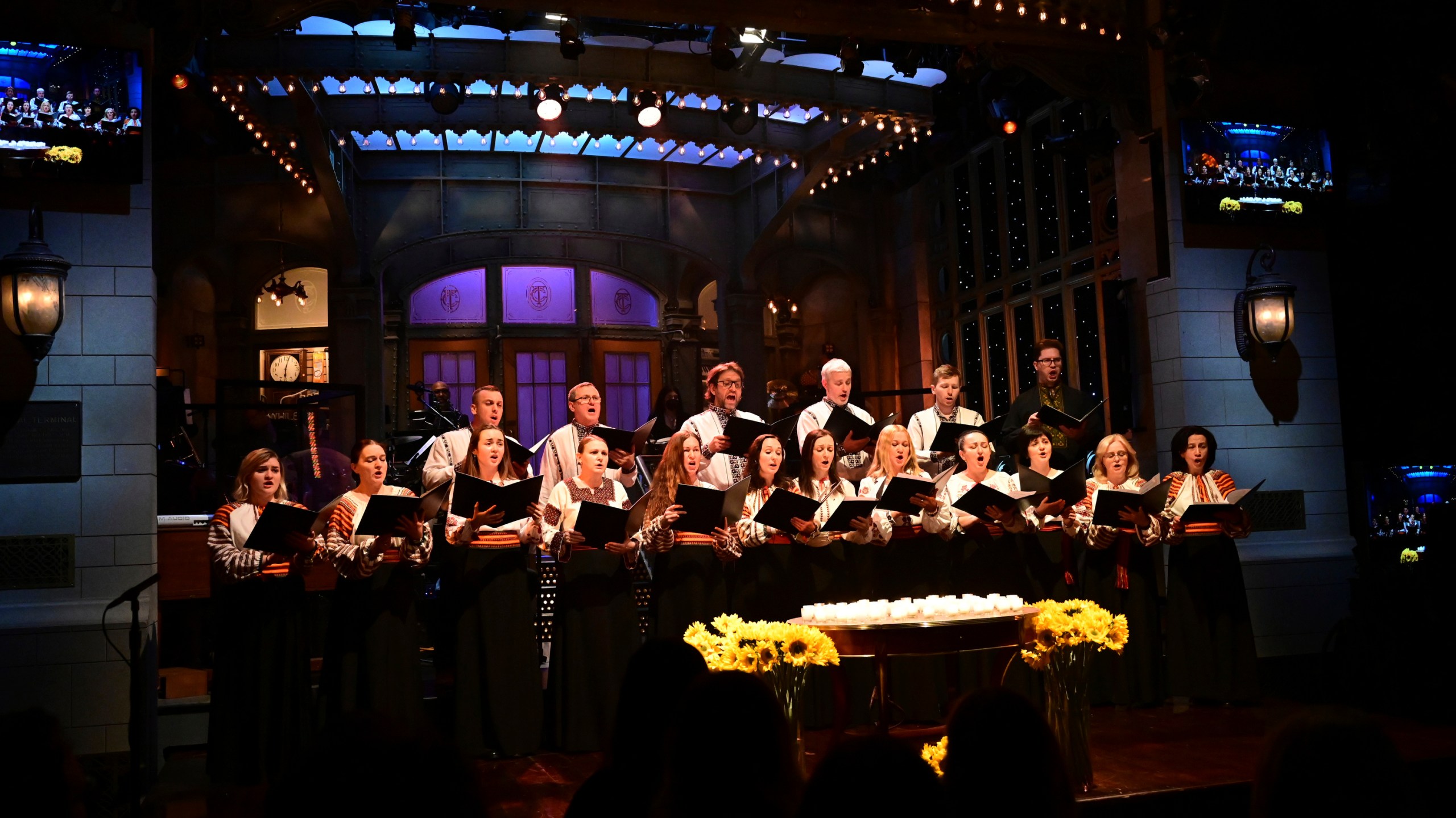 This photo provided by NBC shows Ukrainian Chorus Dumka of New York performing "Prayer for Ukraine" during the opening of “Saturday Night Live” on Saturday, Feb. 26, 2022. (Will Heath/NBC via AP)