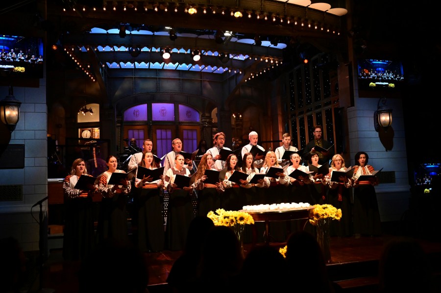 This photo provided by NBC shows Ukrainian Chorus Dumka of New York performing "Prayer for Ukraine" during the opening of “Saturday Night Live” on Saturday, Feb. 26, 2022. (Will Heath/NBC via AP)