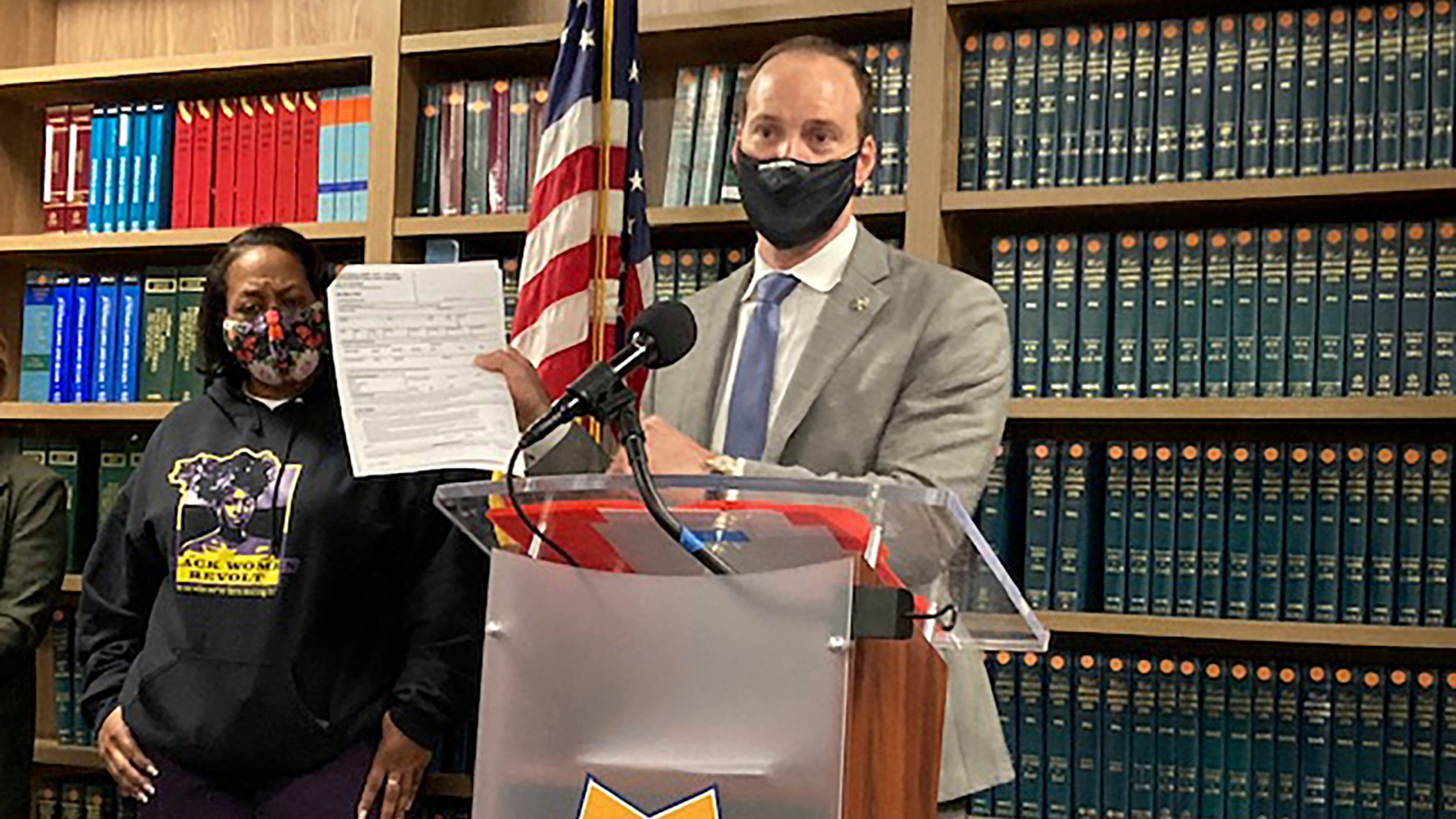 San Francisco District Attorney Chesa Boudin holds a report at a news conference in San Francisco, Tuesday, Feb. 15, 2022. Boudin's stunning assertion that police crime labs are using rape and sexual assault survivors' DNA without their consent to investigate unrelated crimes and storing the DNA indefinitely has shocked prosecutors nationwide, as sexual assault victims' groups decry the chilling effect it could have on people willing to report sexual assaults. (AP Photo/Olga R. Rodrigues)