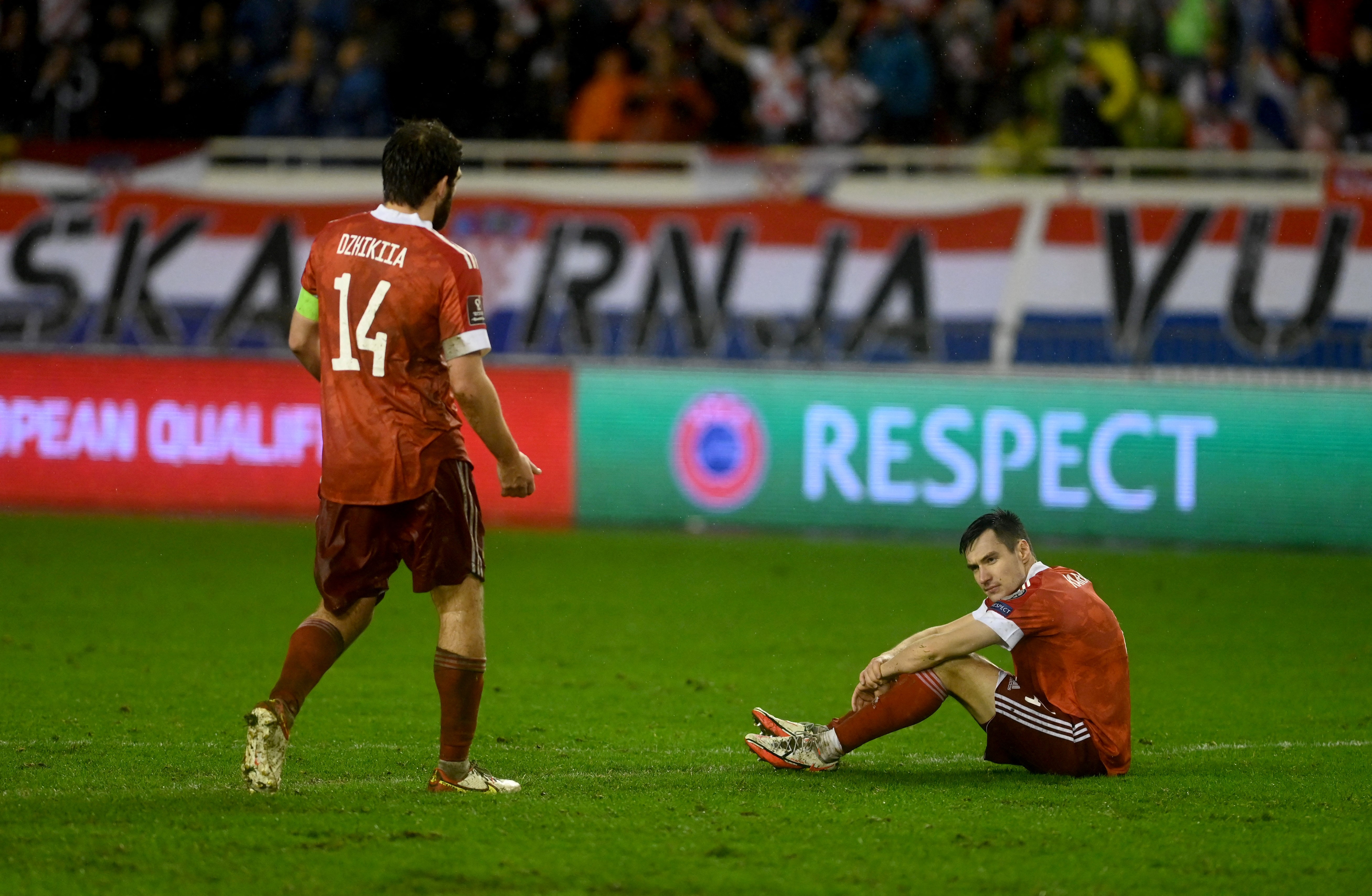 Russia's Georgi Dzhikiya (R) reacts at the end of the FIFA World Cup 2022 qualification football match between Croatia and Russia at the Poljud Stadium in Split on November 14, 2021. (DENIS LOVROVIC/AFP via Getty Images)