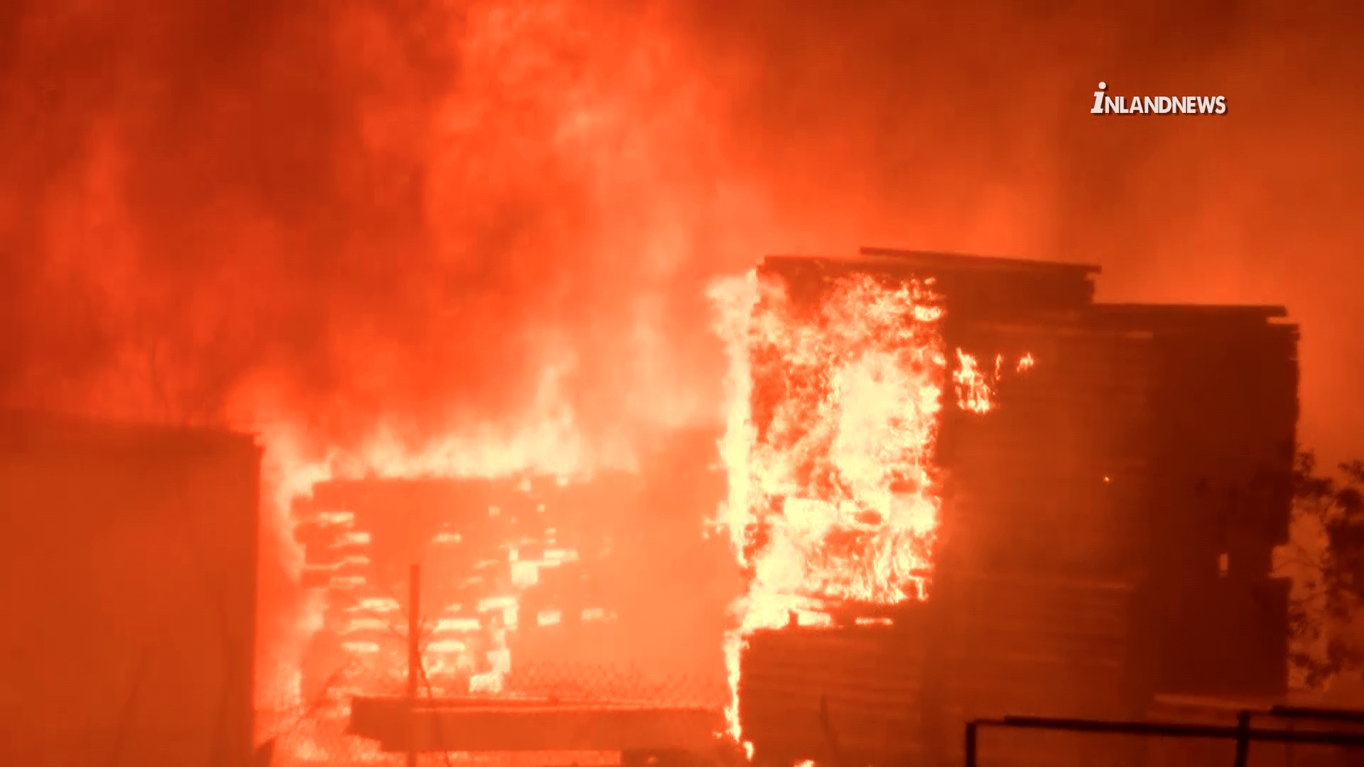 Stacks of pallets burned in a four-alarm fire in Riverside on Feb. 27, 2022. (Inland News)