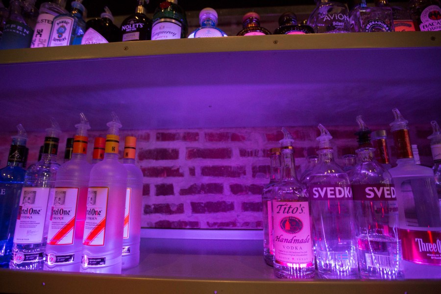 An empty space on a liquor shelf where Russian vodka used to be located at The Sidetrack, a gay bar on the north side of Chicago, July 29, 2013. The United States and Europe are slapping official sanctions on Russian banks and tech companies.  But bars and liquor stores across America and Canada have found another way to punish Russia for invading Ukraine: They’re pulling Russian vodka off their shelves and promoting Ukrainian brands instead. (AP Photo/Scott Eisen)