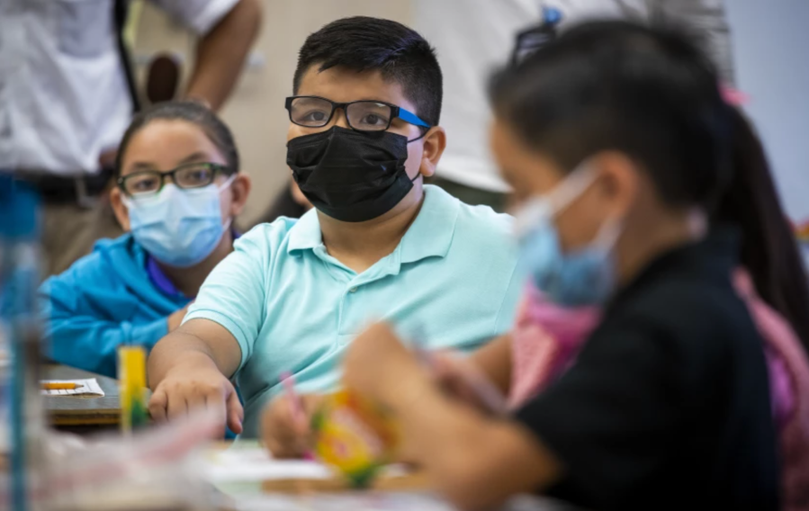 Third-grade dual-language students wear masks during class at Montara Avenue Elementary School in August.(Allen J. Schaben / Los Angeles Times)