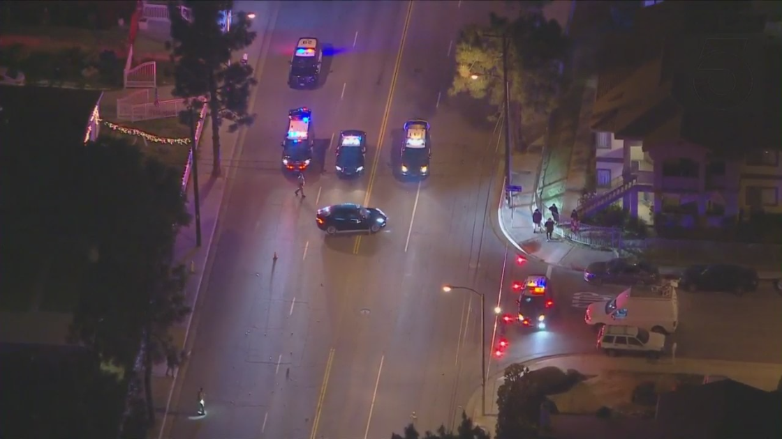 Police respond to the scene of a crash involving an Azusa police officer in an unincorporated area of the San Gabriel Valley on Jan. 31, 2022. (KTLA)