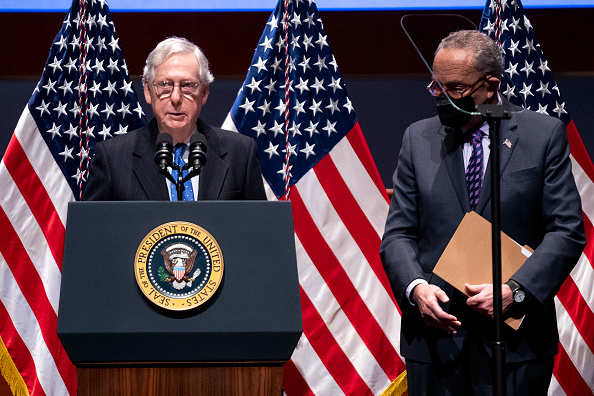 Senate Minority Leader Mitch McConnell (R-Ky.) and Senate Majority Leader Charles Schumer (D-N.Y.) address at the National Prayer Breakfast at the U.S. Capitol on February 3, 2022 in Washington, DC. (Greg Nash-Pool/Getty Images)