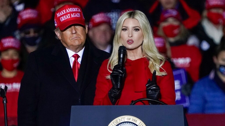 President Donald Trump watches as daughter Ivanka Trump speaks at a campaign event at the Kenosha Regional Airport, Nov. 2, 2020, in Kenosha, Wis. (AP Photo/Morry Gash, File)