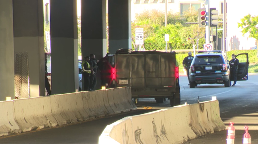 A pedestrian was run over by a trailer following an argument with a driver in North Hollywood (KTLA)