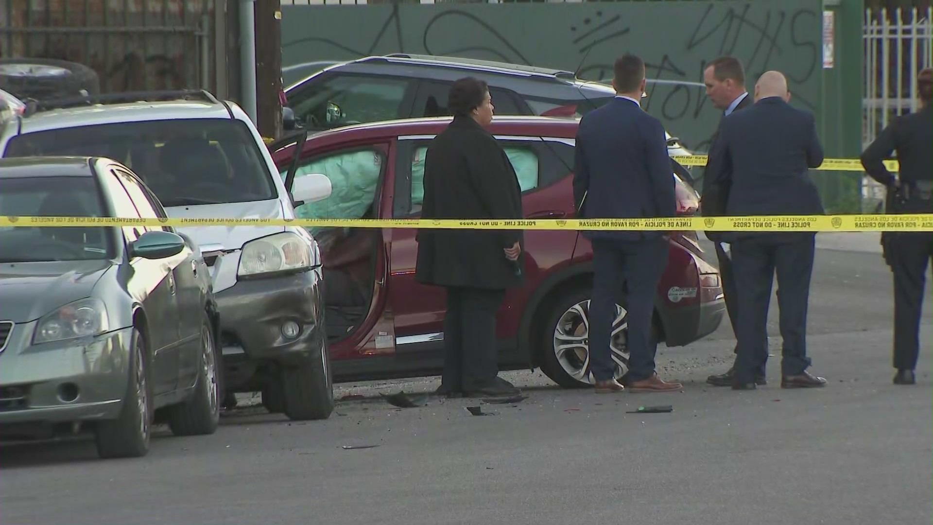 Investigators probe the scene of a shooting in Valley Glen on Feb. 28, 2022. (KTLA)