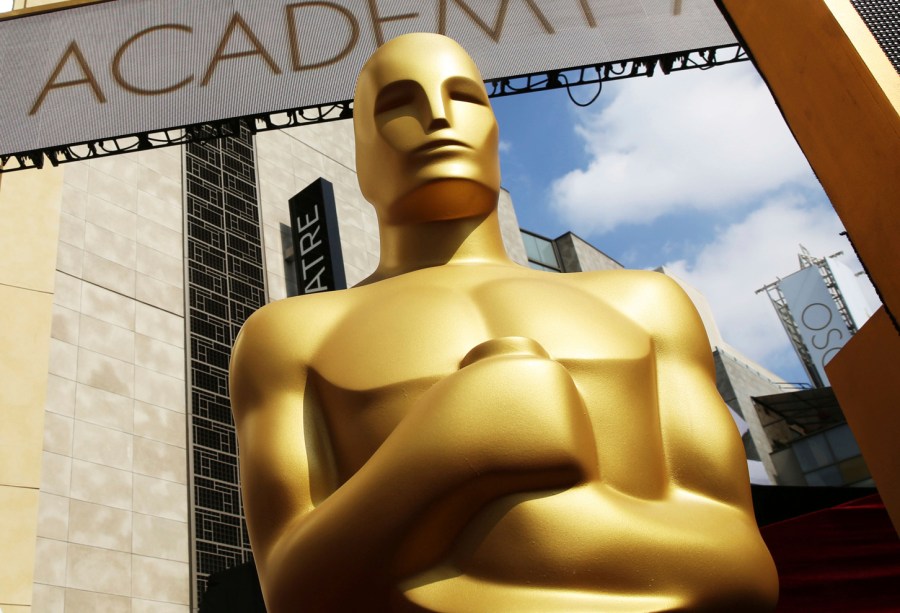 In this Feb. 21, 2015 file photo, an Oscar statue appears outside the Dolby Theatre for the 87th Academy Awards in Los Angeles. (Matt Sayles/Invision/AP)