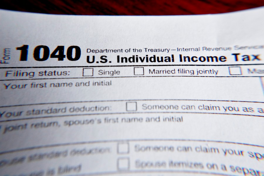 This Wednesday, Feb. 13, 2019, file photo shows part of a 1040 federal tax form printed from the Internal Revenue Service website, in Zelienople, Pa. (AP Photo/Keith Srakocic, File)