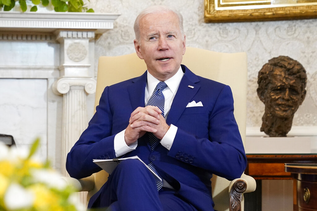 President Joe Biden sits in the Oval Office of the White House, on March 4, 2022, in Washington. (AP Photo/Patrick Semansky, File)