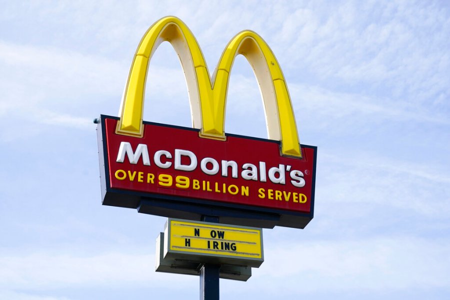 A sign is displayed outside a McDonald's restaurant, Tuesday, April 27, 2021, in Des Moines, Iowa. (AP Photo/Charlie Neibergall, File)