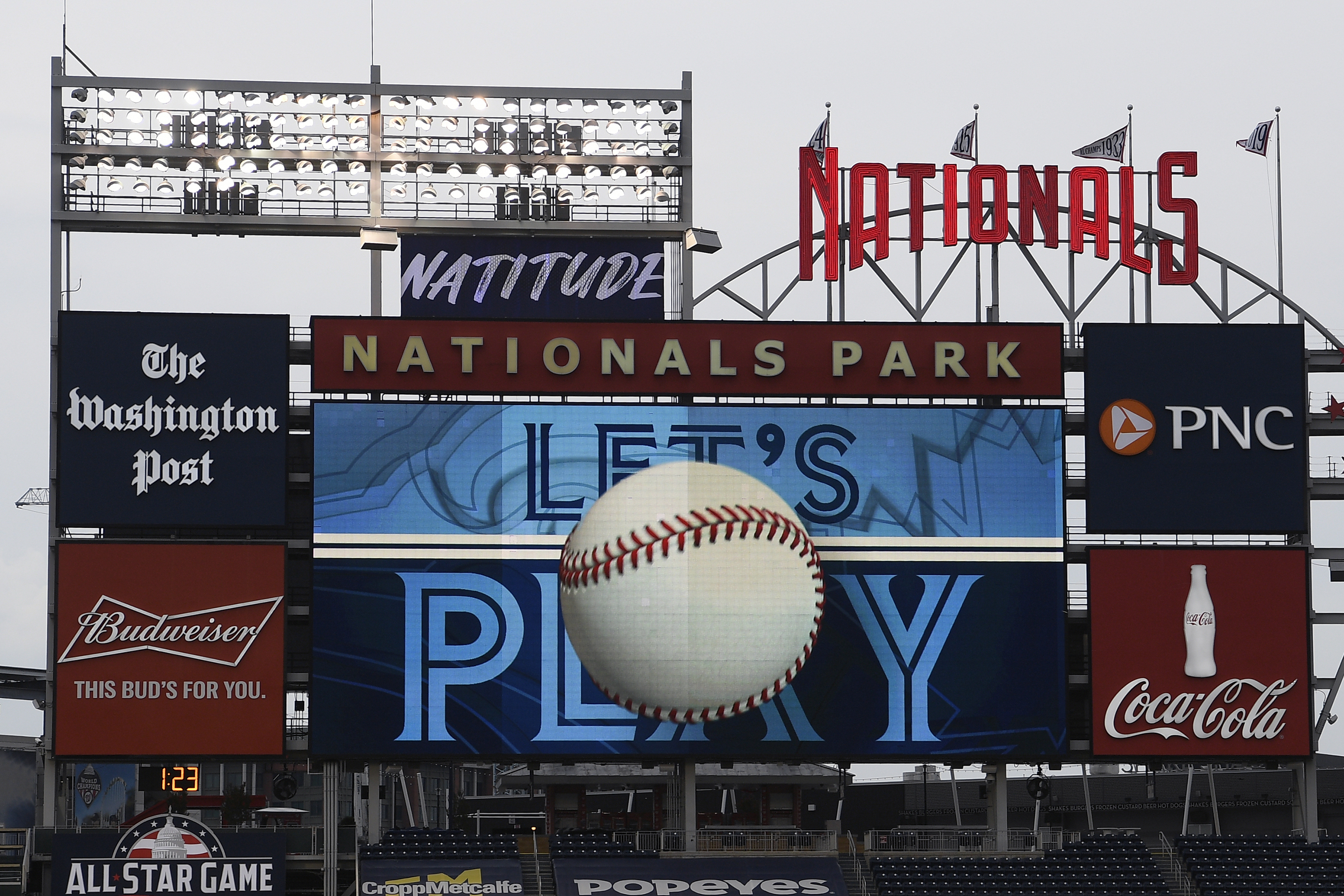 The scoreboard plays the seventh inning stretch themes of the Toronto Blue Jays at a baseball game between the Blue Jays and the Washington Nationals, on July 30, 2020, in Washington. (Nick Wass/Associated Press)