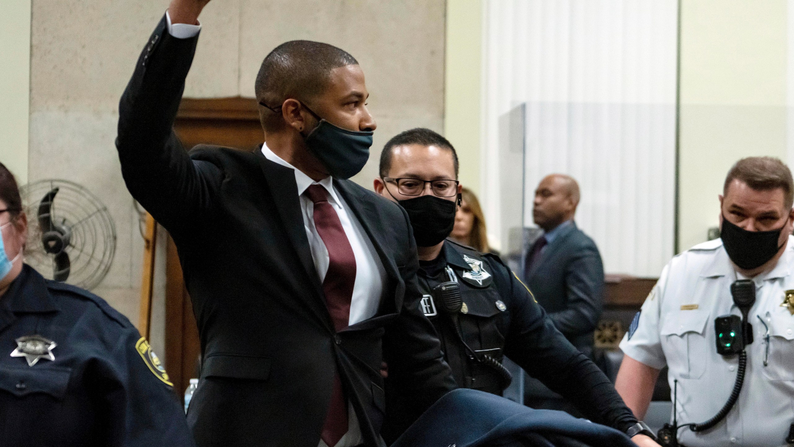 Actor Jussie Smollett is led out of the courtroom after being sentenced at the Leighton Criminal Court Building on March 10, 2022, in Chicago. (Brian Cassella/Chicago Tribune via AP, Pool)