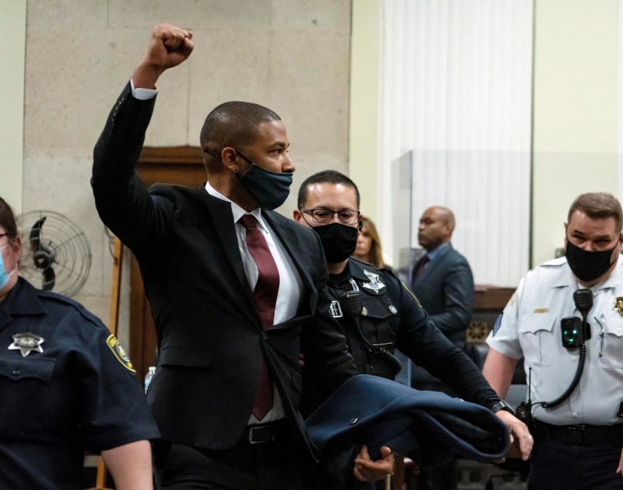 Actor Jussie Smollett is led out of the courtroom after being sentenced at the Leighton Criminal Court Building on March 10, 2022, in Chicago. (Brian Cassella/Chicago Tribune via AP, Pool)