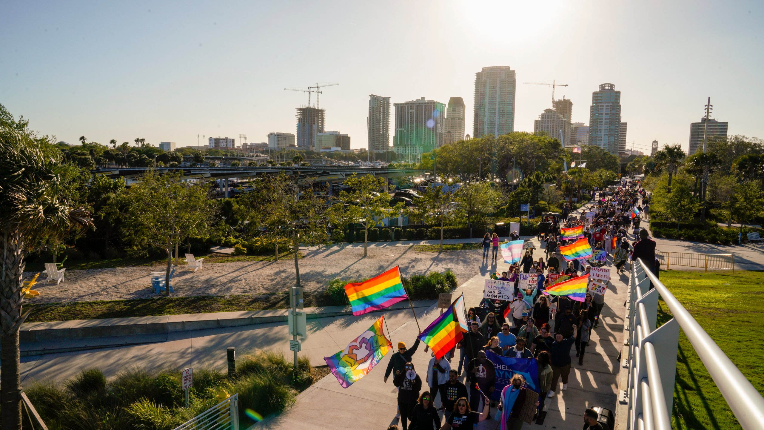 Marchers make their way toward the St. Pete Pier in St. Petersburg, Fla., on Saturday, March 12, 2022 during a march to protest the controversial "Don't say gay" bill passed by Florida's Republican-led legislature and now on its way to Gov. Ron DeSantis' desk. (Martha Asencio-Rhine/Tampa Bay Times via AP)