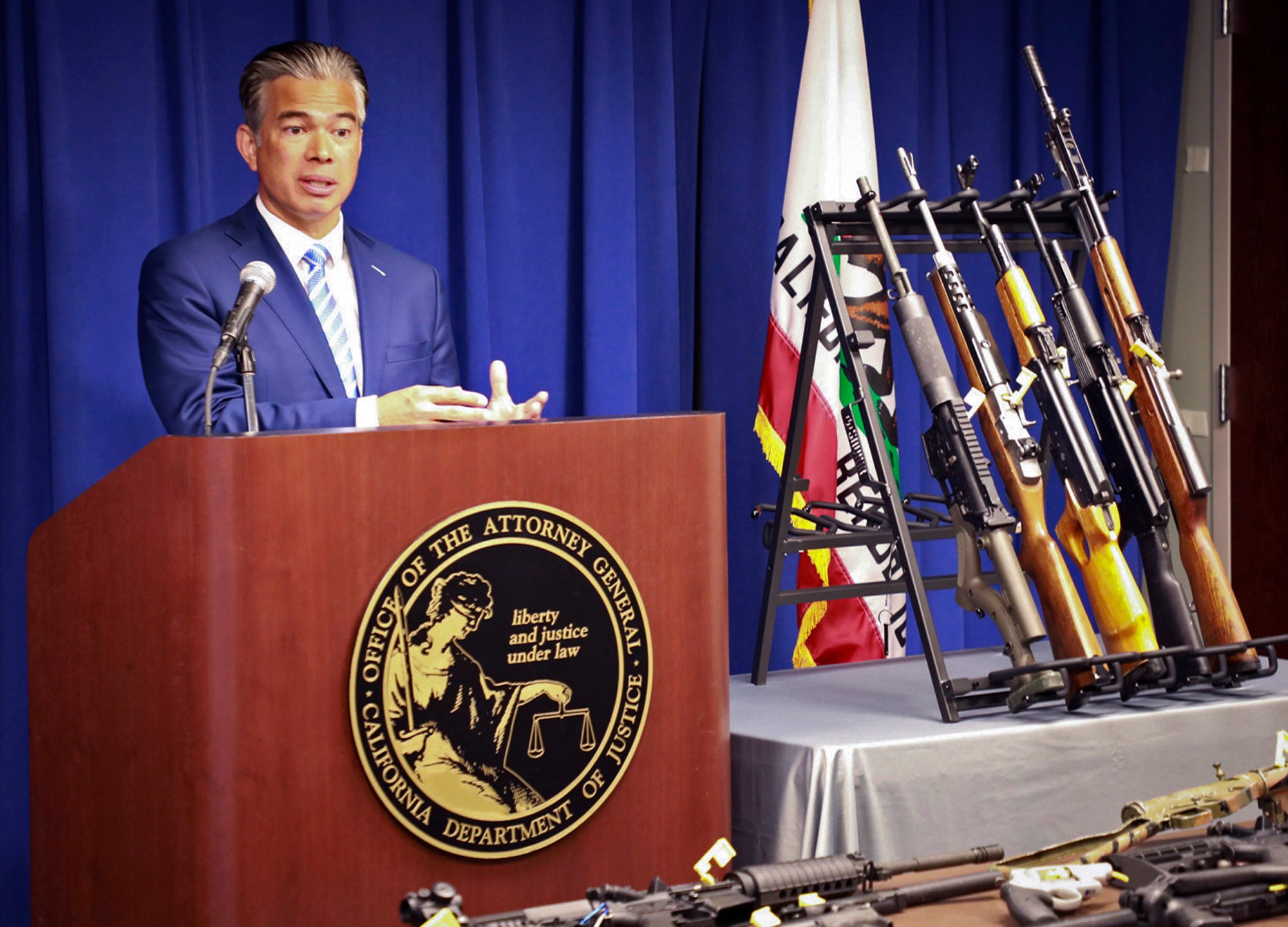 In this photo released by the California Department of Justice, state Attorney General Rob Bonta talks about the Armed and Prohibited Persons System, known as APPS, during a news conference in Sacramento, Calif. on March 30, 2022. (California Department of Justice via AP)