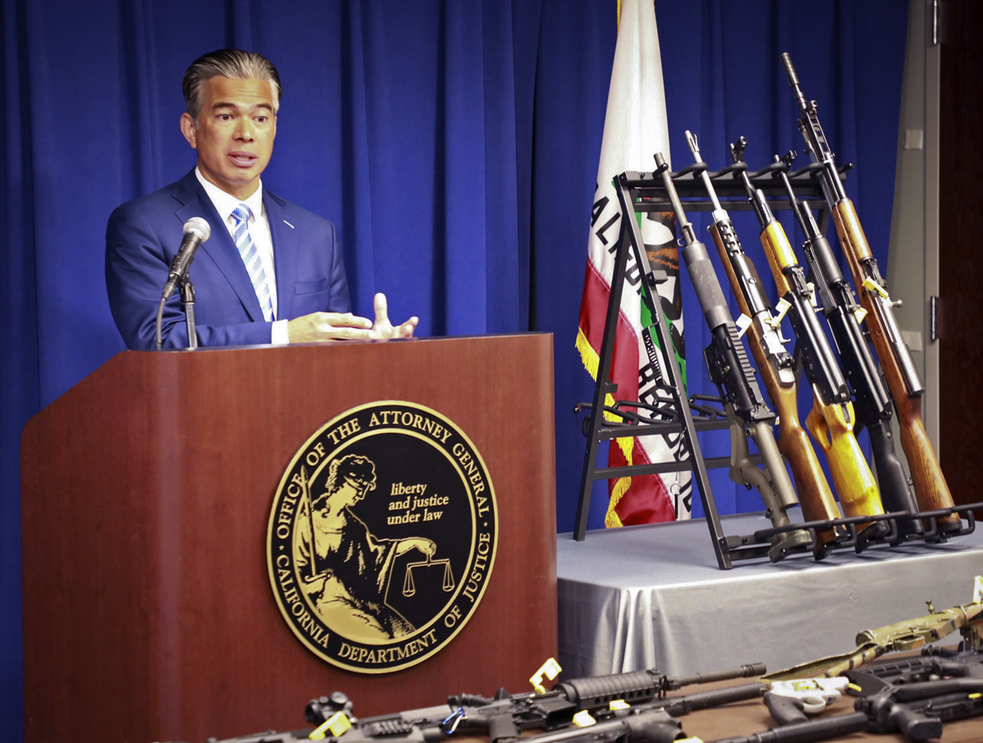 In this photo released by the California Department of Justice, state Attorney General Rob Bonta talks about the Armed and Prohibited Persons System, known as APPS, during a news conference in Sacramento, Calif. on March 30, 2022. (California Department of Justice via AP)