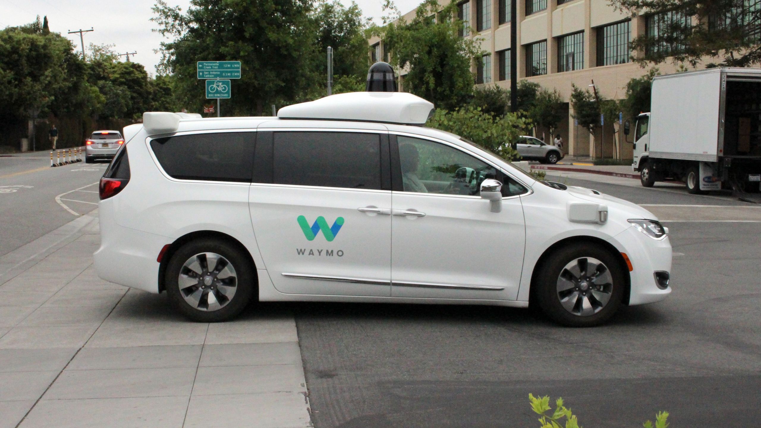 A Waymo self-driving car pulls into a parking lot at the Google-owned company's headquarters in Mountain View, California, on May 8, 2019. (GLENN CHAPMAN/AFP via Getty Images)