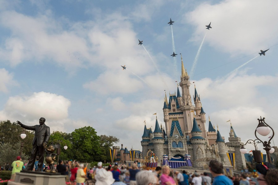 This handout file photo provided by Disney Parks shows the U.S. Navy Flight Demonstration Squadron, the Blue Angels, streaking across the skies above, Cinderella Castle March 19, 2015 at Walt Disney World Resort in Lake Buena Vista, Florida. (Mariah Wild/Disney Parks via Getty Images)