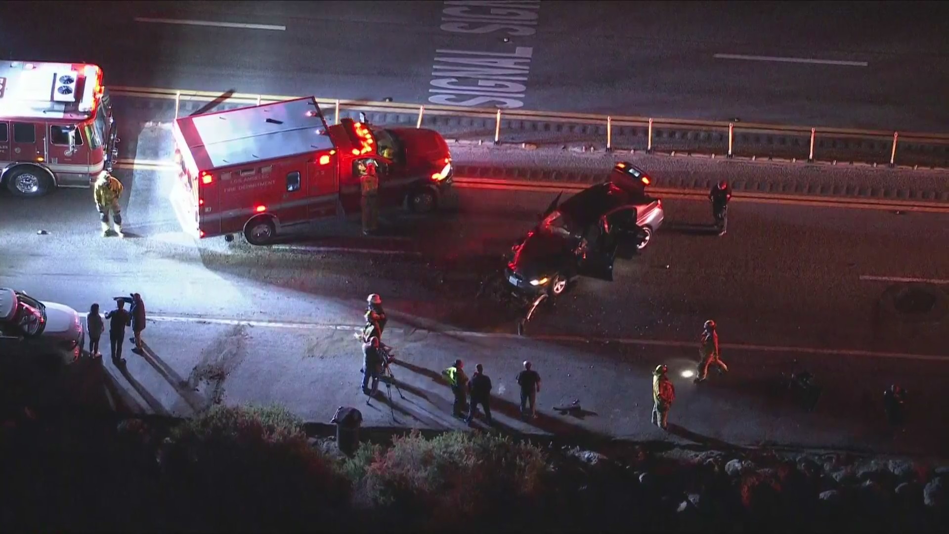 A hit-and-run crash in the Pacific Palisades sent a car into the ocean on March 17, 2022. (KTLA)