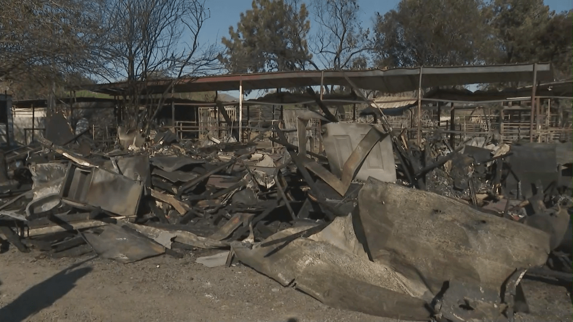 The aftermath of a deadly fire in Jurupa Valley is seen on March 1, 2022. (KTLA)