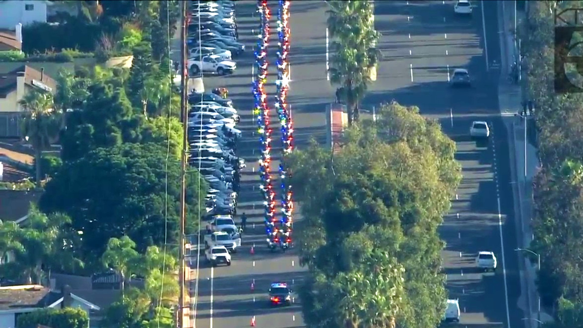 A procession to honor Officer Nicholas Vella is underway on March 8, 2022. (KTLA)