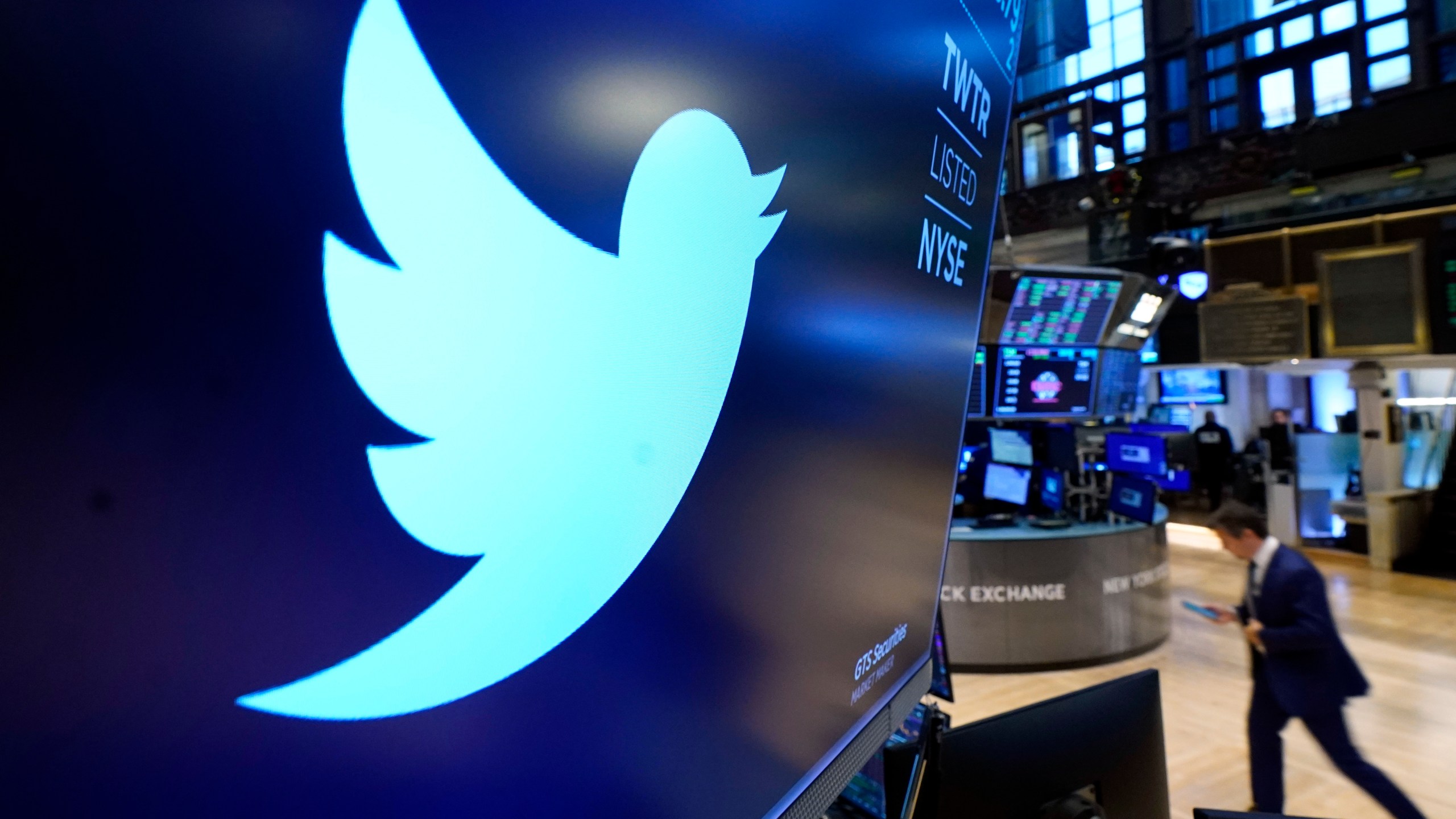 The logo for Twitter appears above a trading post on the floor of the New York Stock Exchange on Nov. 29, 2021. (Richard Drew/Associated Press)