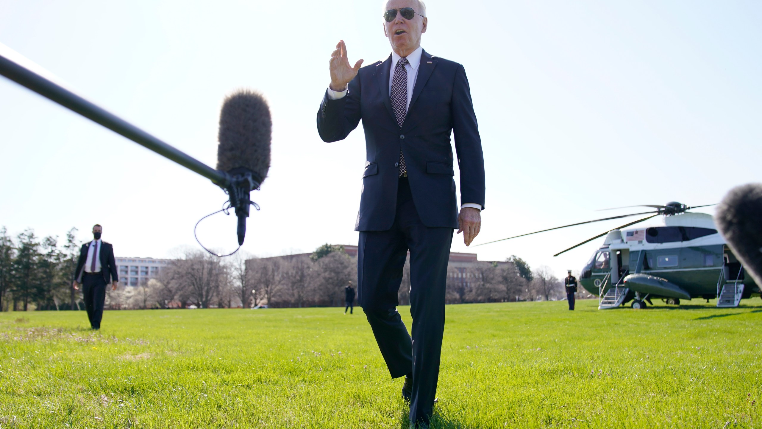 President Joe Biden speaks to the media at Fort Lesley J. McNair, Monday, April 4, 2022, as he returns to Washington and the White House after spending the weekend in Wilmington, Del. (AP Photo/Andrew Harnik)