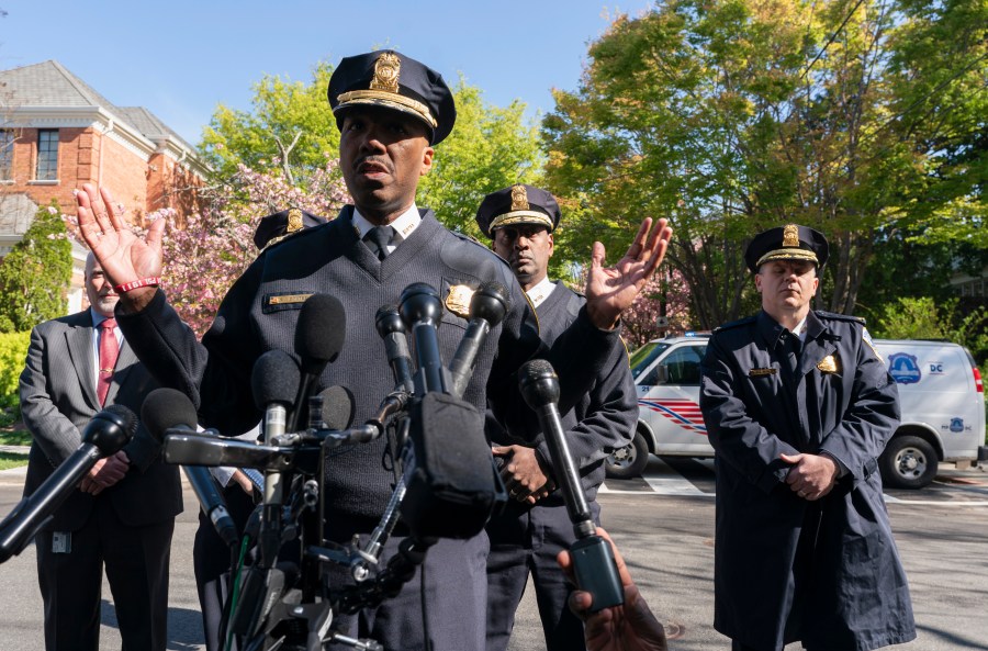 Washington Metropolitan Police Chief Robert Contee III, speaks to reporters near the Peruvian ambassador's residence in northwest Washington, Wednesday, April 20, 2022. U.S. Secret Service officers shot "an intruder" Wednesday at the residence of the Peruvian ambassador to the United States in Washington, authorities said. (AP Photo/Manuel Balce Ceneta)