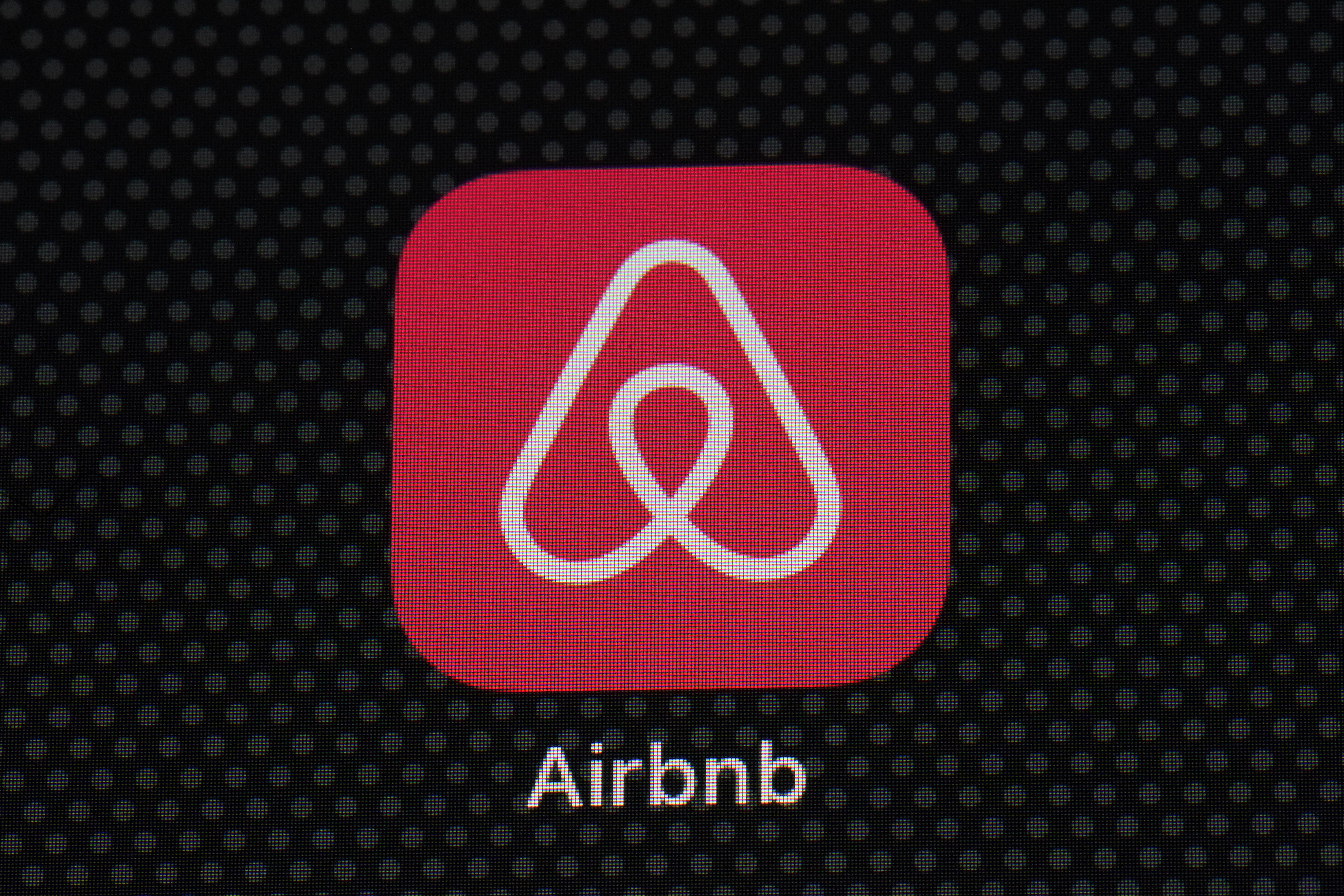 The Airbnb app icon is seen on an iPad screen, Saturday, May 8, 2021, in Washington. (Patrick Semansky/Associated Press)