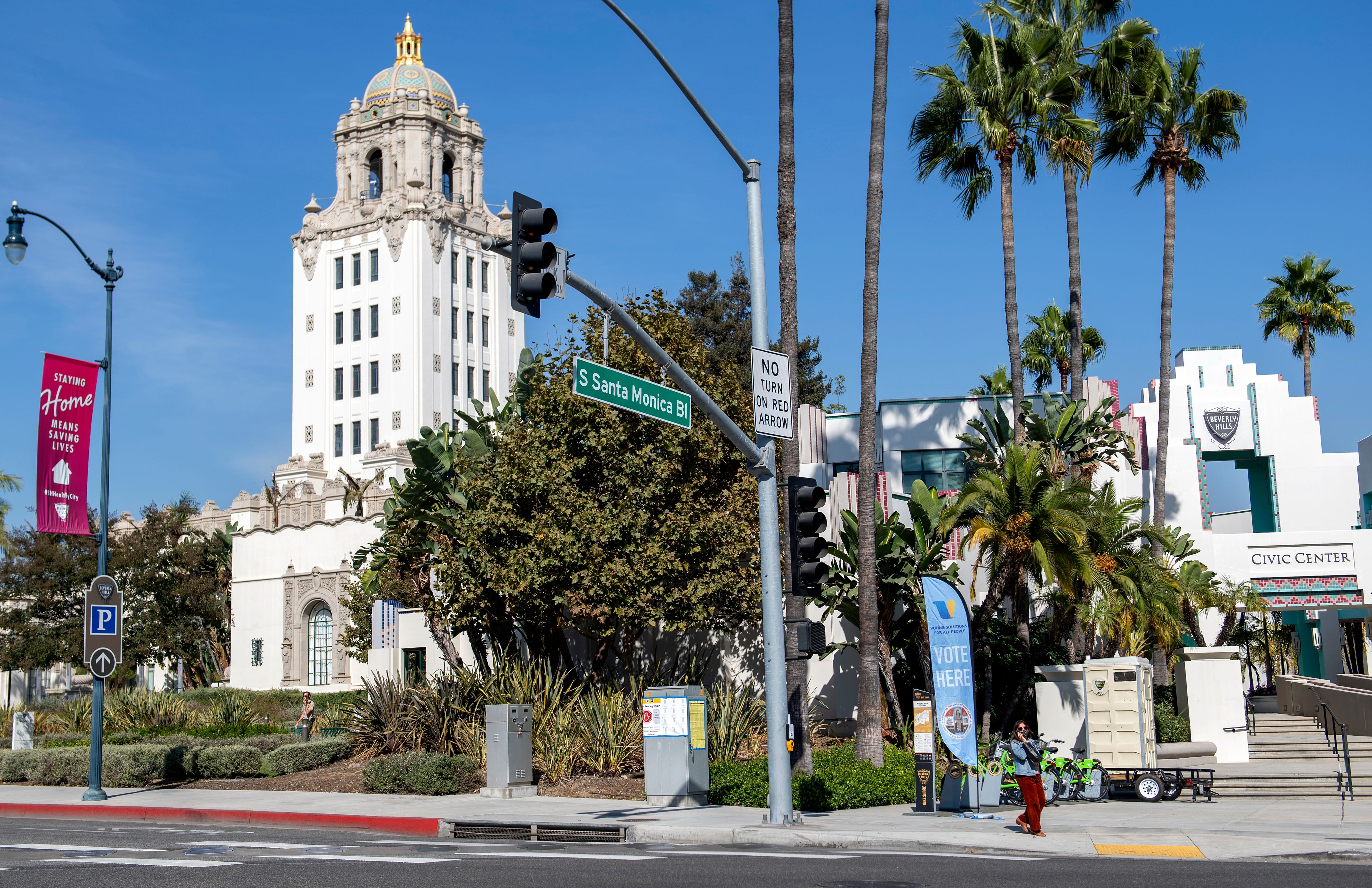 A sign indicates that there is a vote center at Beverly Hills City Hall, October 27, 2020, in Beverly Hills, California. (Photo by Valerie Macon/AFP via Getty Images)