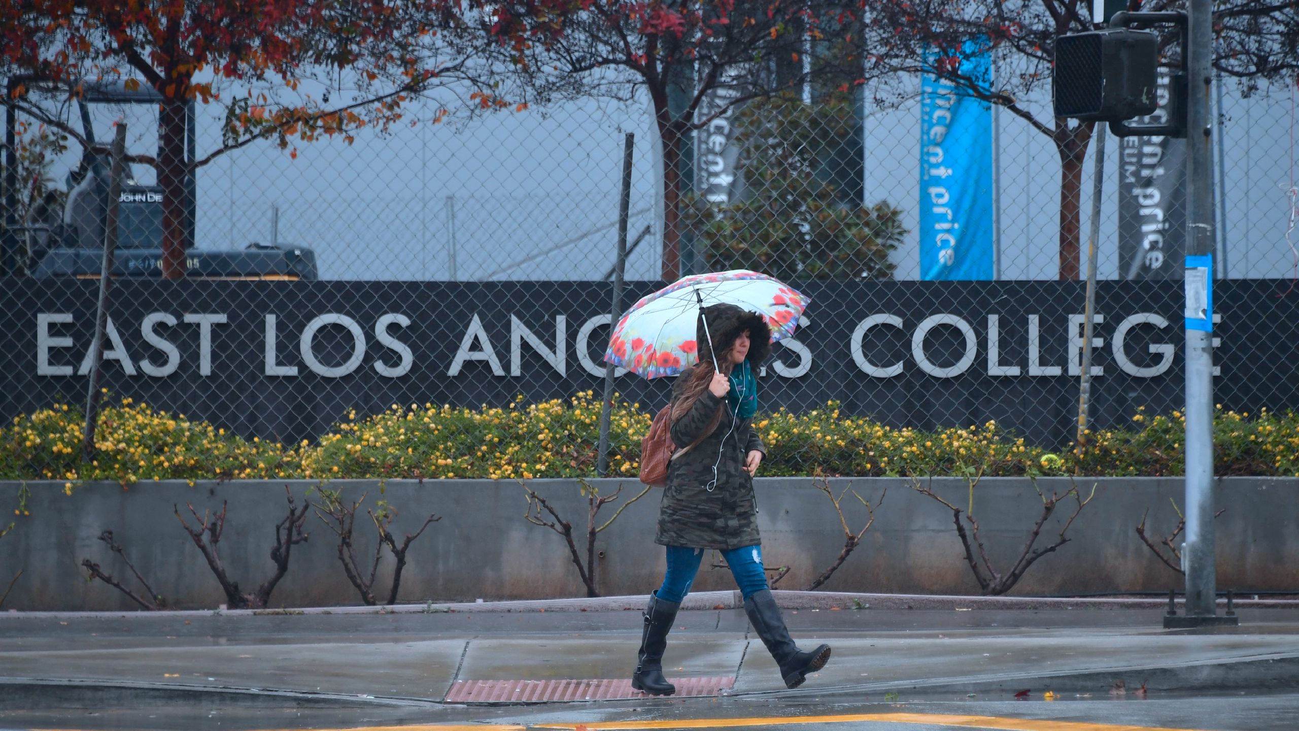 A pedestrian walks past East Los Angeles College in Monterey Park on Jan. 16, 2019. (FREDERIC J. BROWN/AFP via Getty Images)