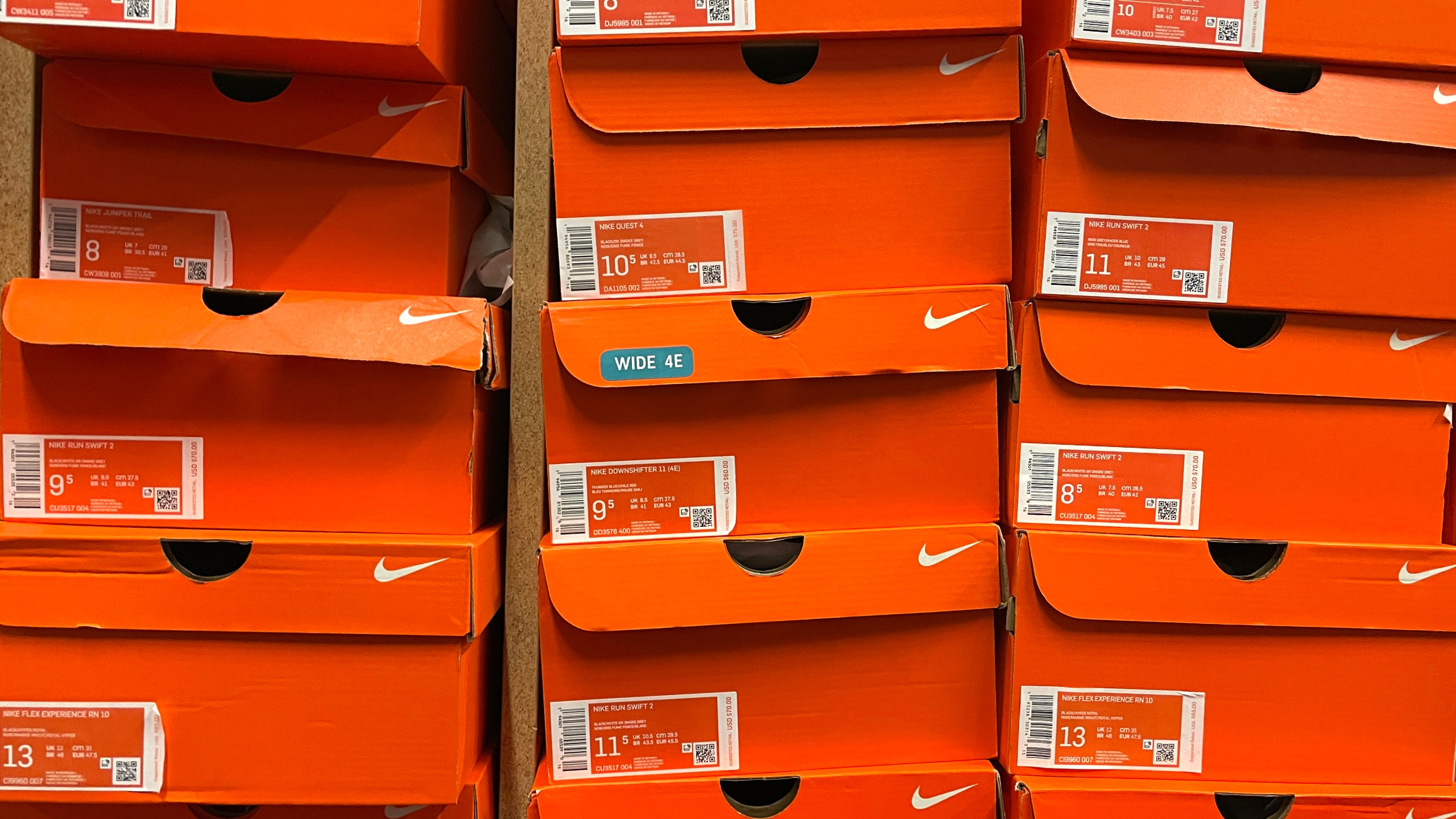 This file photo shows stacks of Nike shoe boxes at a shoe store in California. (Justin Sullivan/Getty Images)