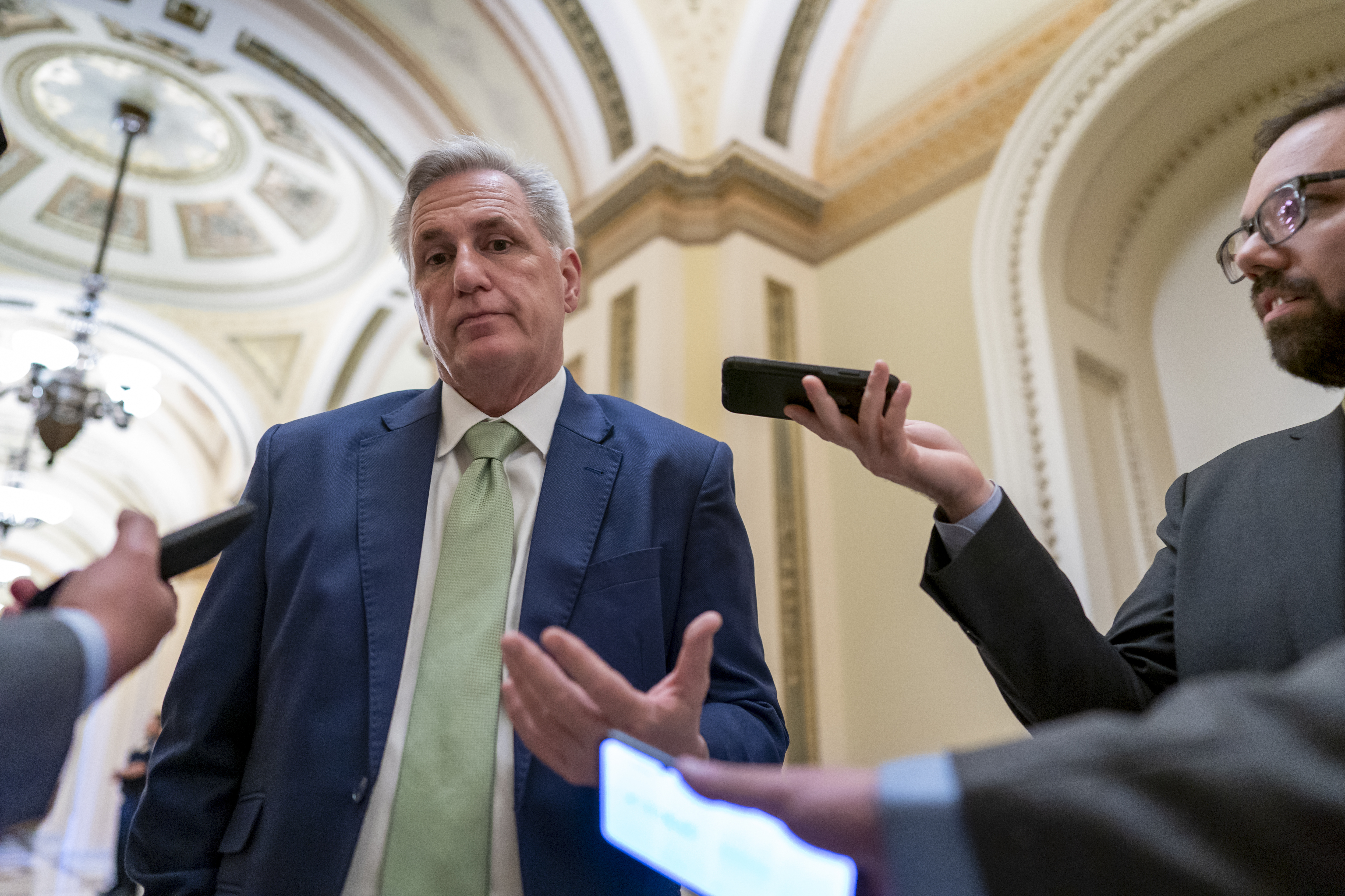 House Minority Leader Kevin McCarthy, R-Calif., talks to reporters at the Capitol in Washington, April 6, 2022. McCarthy is downplaying secretly recorded remarks he made about Donald Trump shortly after last year's attack on the Capitol. He also says he never told the then-president that he should resign — something that has not been reported. (AP Photo/J. Scott Applewhite, File)