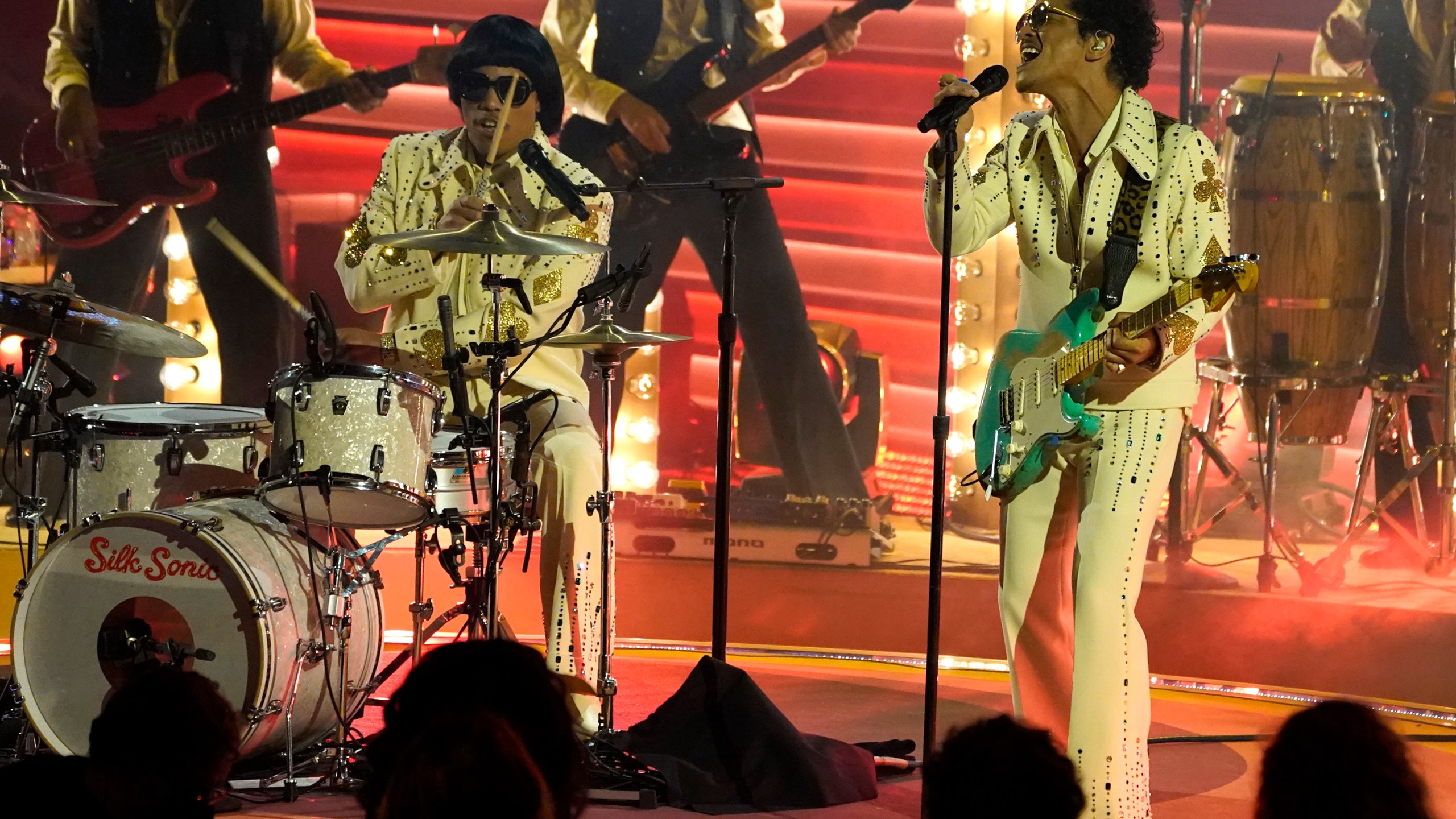 Anderson .Paak, left, and Bruno Mars of Silk Sonic perform "777" at the 64th Annual Grammy Awards on Sunday, April 3, 2022, in Las Vegas. (AP Photo/Chris Pizzello)