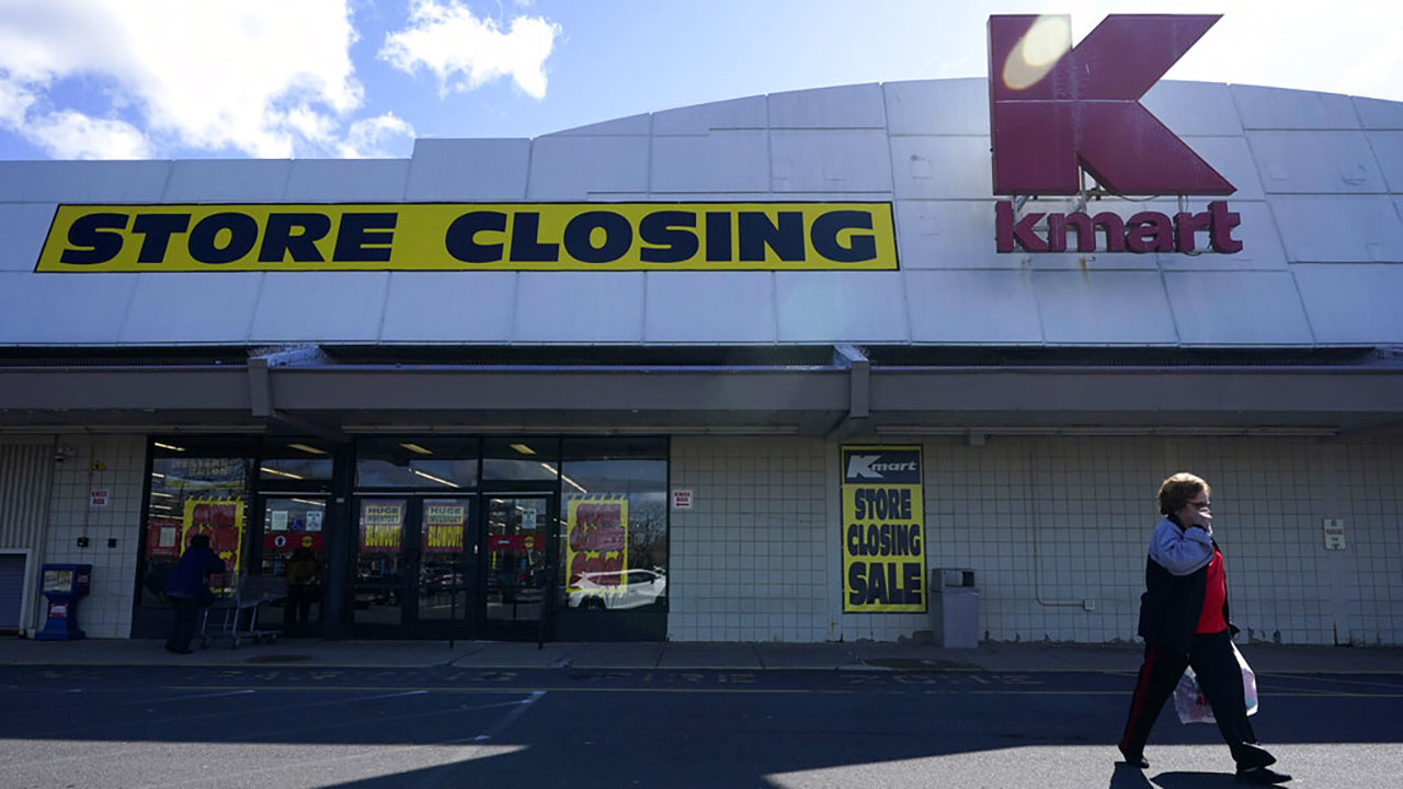 People walk into a Kmart in Avenel, N.J., Monday, April 4, 2022. When the New Jersey store closes its doors on April 16, it will leave only three remaining U.S. locations for the former retail powerhouse. (AP Photo/Seth Wenig)