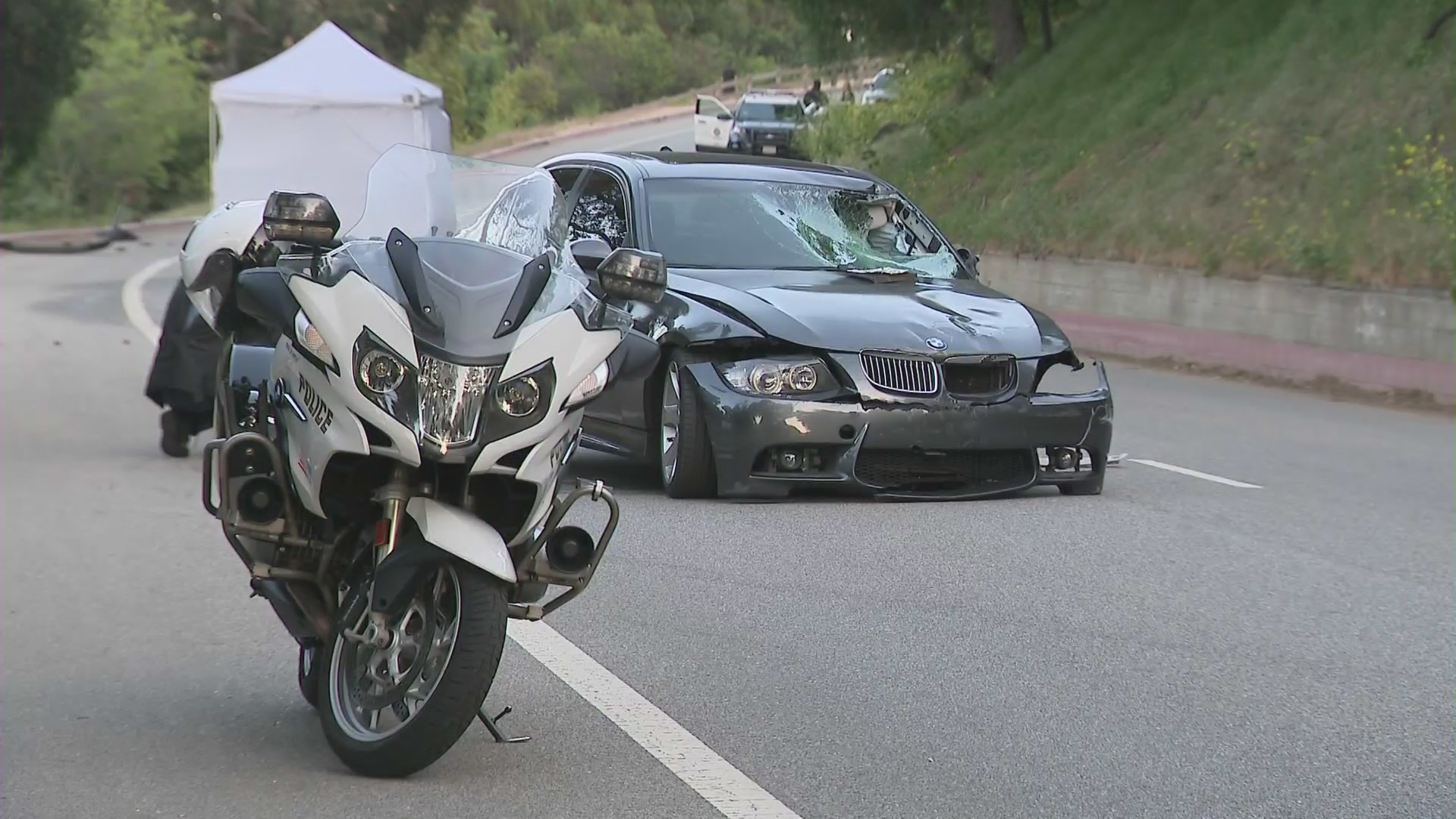 The scene after a hit-and-run crash that killed 77-year-old bicyclist in Griffith Park on April 16, 2022. (KTLA)