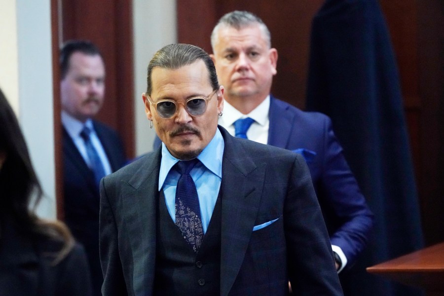 Actor Johnny Depp arrives in the courtroom after lunch, at the Fairfax County Circuit Court in Fairfax, Va., on May 2, 2022. (Steve Helber/Associated Press)