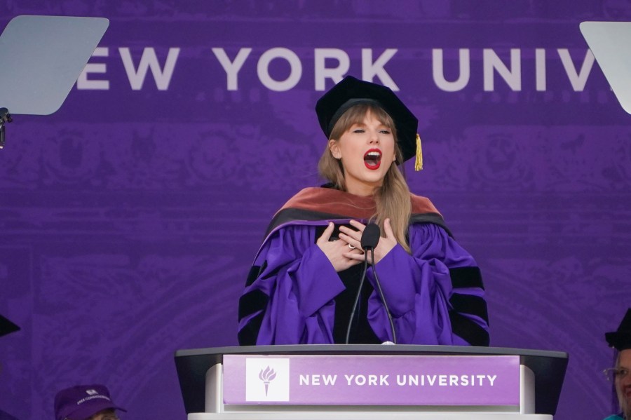 Taylor Swift speaks during a graduation ceremony for New York University at Yankee Stadium in New York, Wednesday, May 18, 2022. (AP Photo/Seth Wenig)