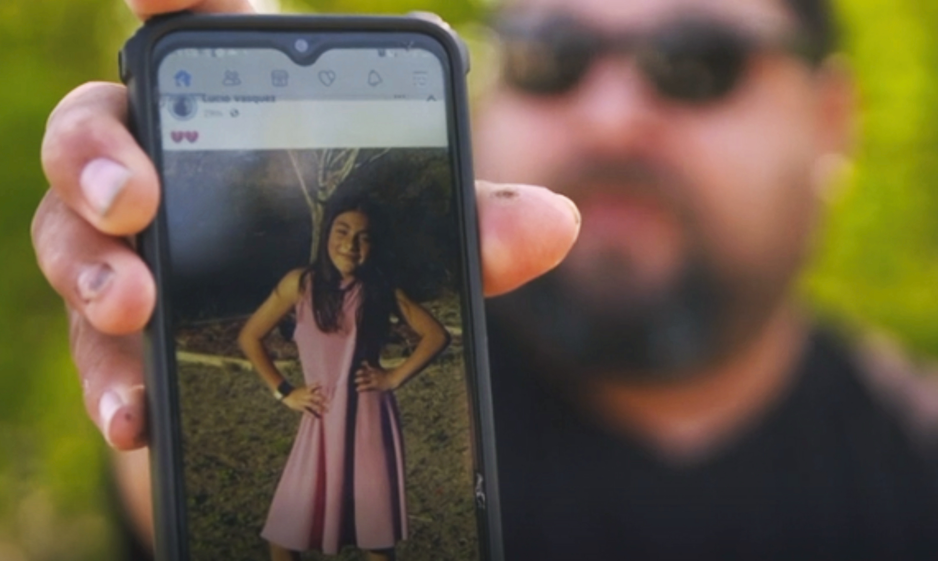 In this image from video, Javier Cazares shows a picture of his daughter, Jacklyn Cazares on May 26, 2022, in Uvalde, Texas. (Robert Bumsted/Associated Press)