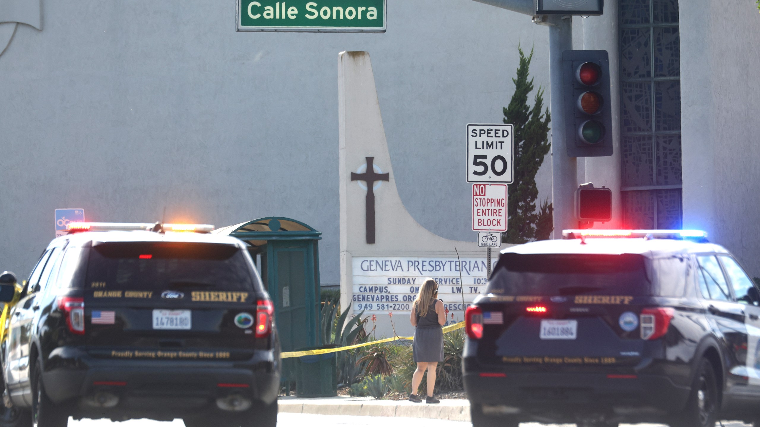 Police vehicles are parked near the scene of a shooting at the Geneva Presbyterian Church on May 15, 2022 in Laguna Woods.(Mario Tama/Getty Images)